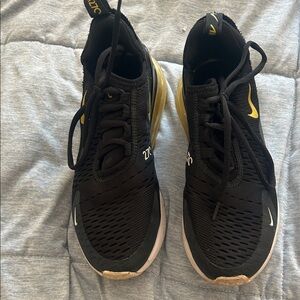 Nike Black and Gold Running Sneakers Sz 7 men/ women comfy like new
